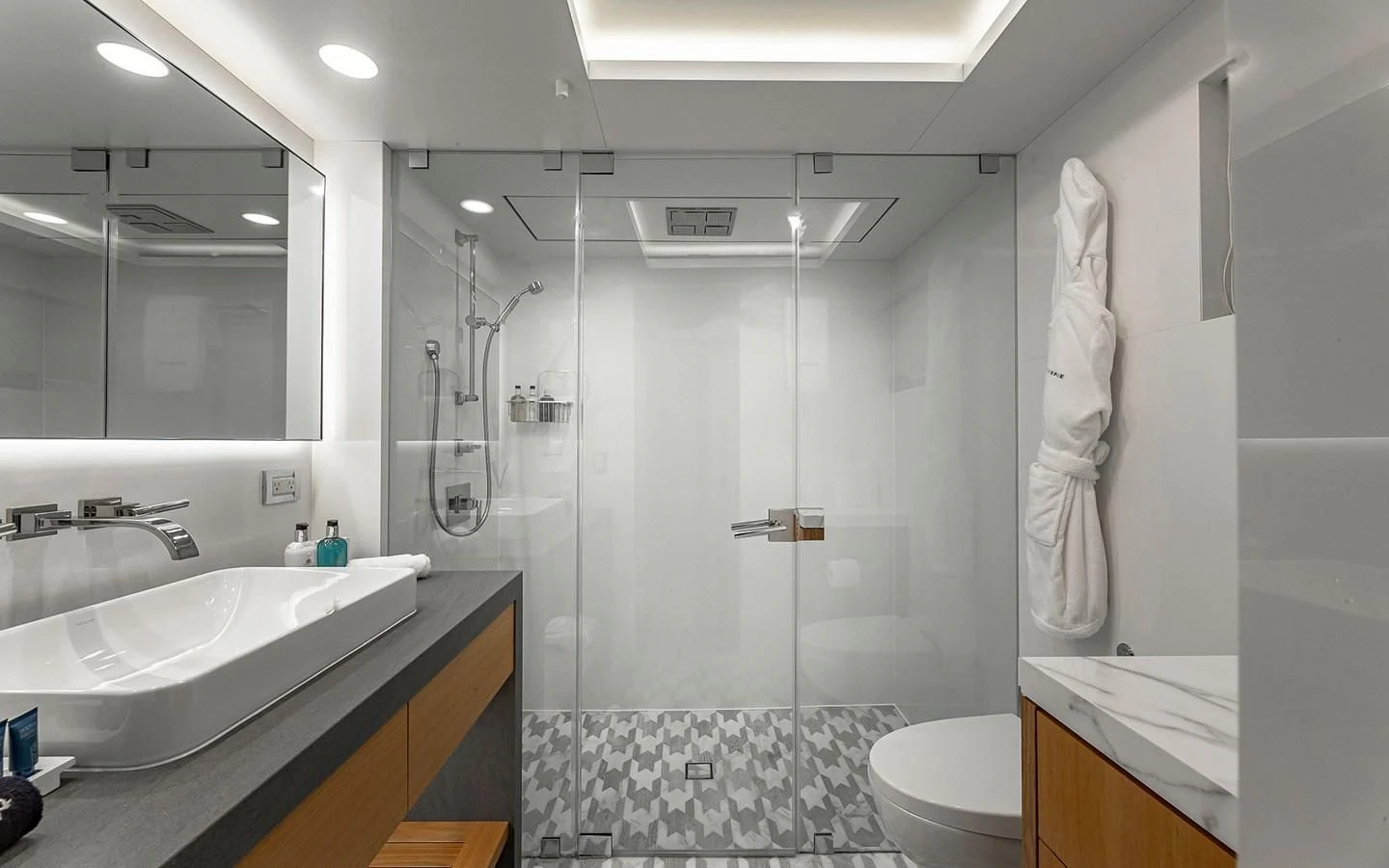 a bathroom with a glass shower aboard REVERIE Yacht for Sale