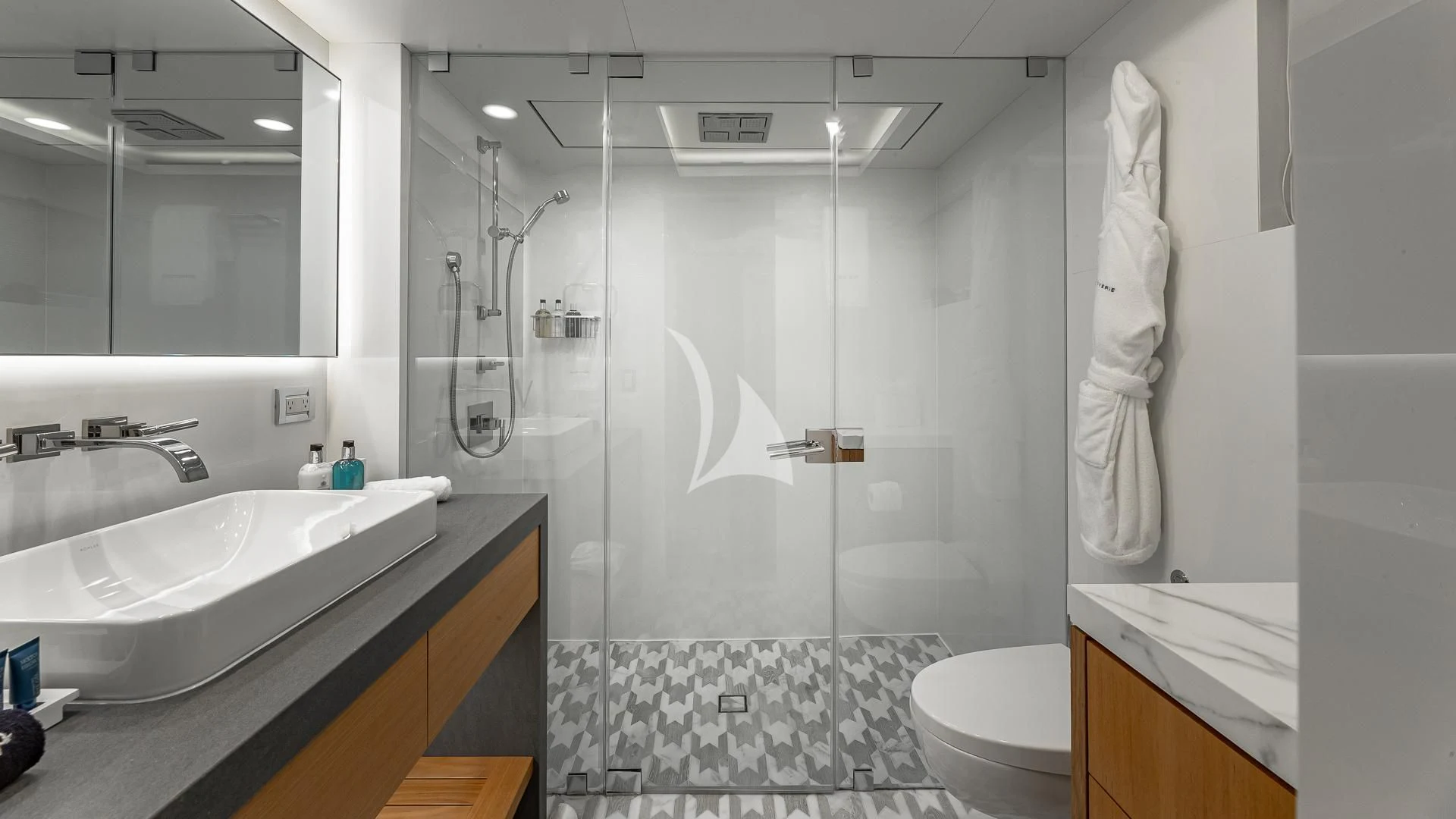 a bathroom with a glass shower aboard REVERIE Yacht for Sale