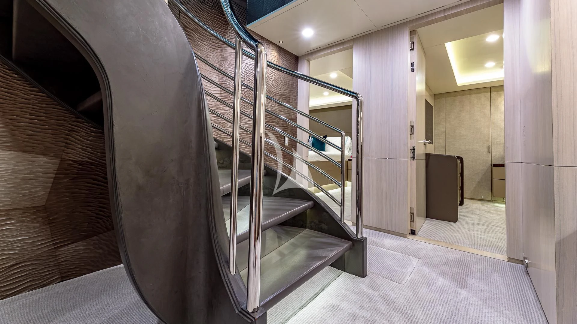 a large hallway with a staircase aboard REVERIE Yacht for Sale