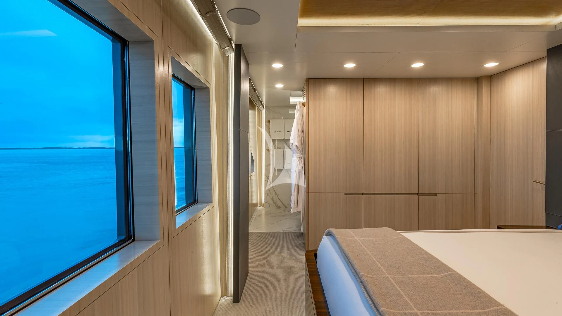 a bathroom with a large mirror aboard REVERIE Yacht for Sale