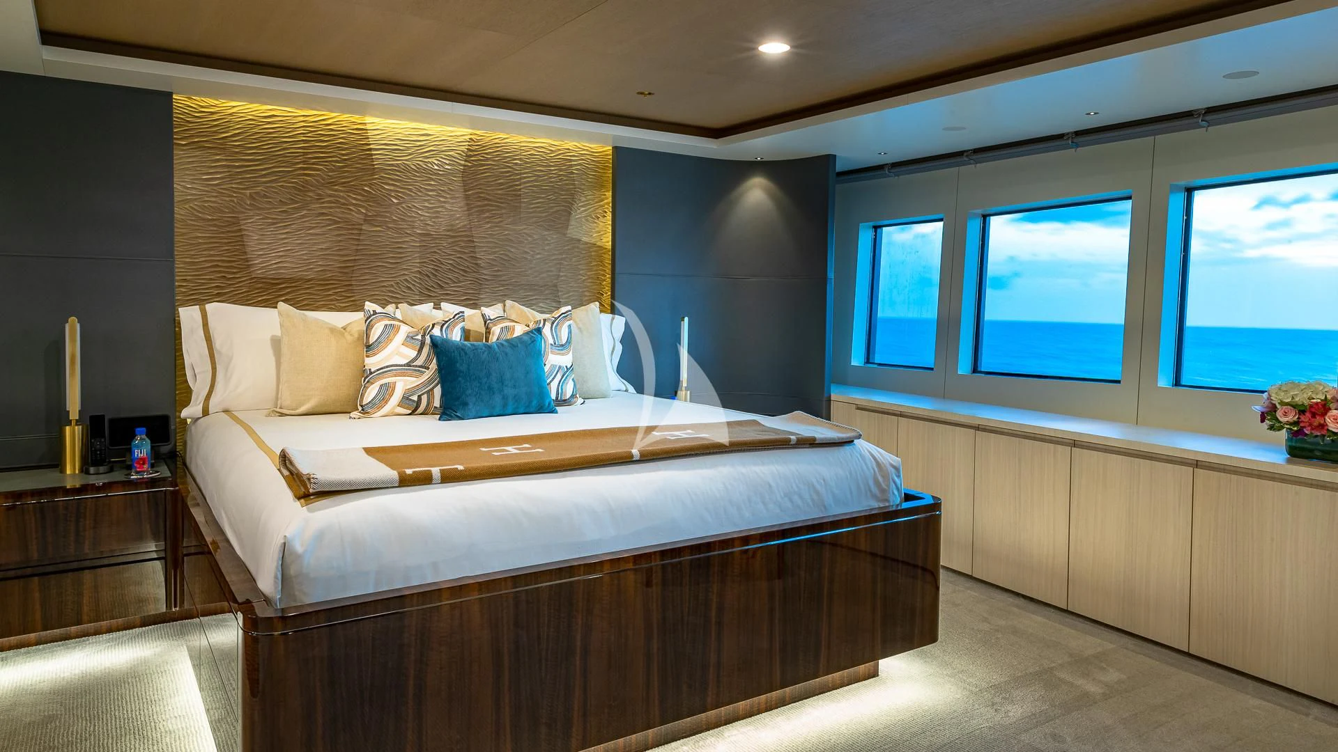 a bed in a room aboard REVERIE Yacht for Sale