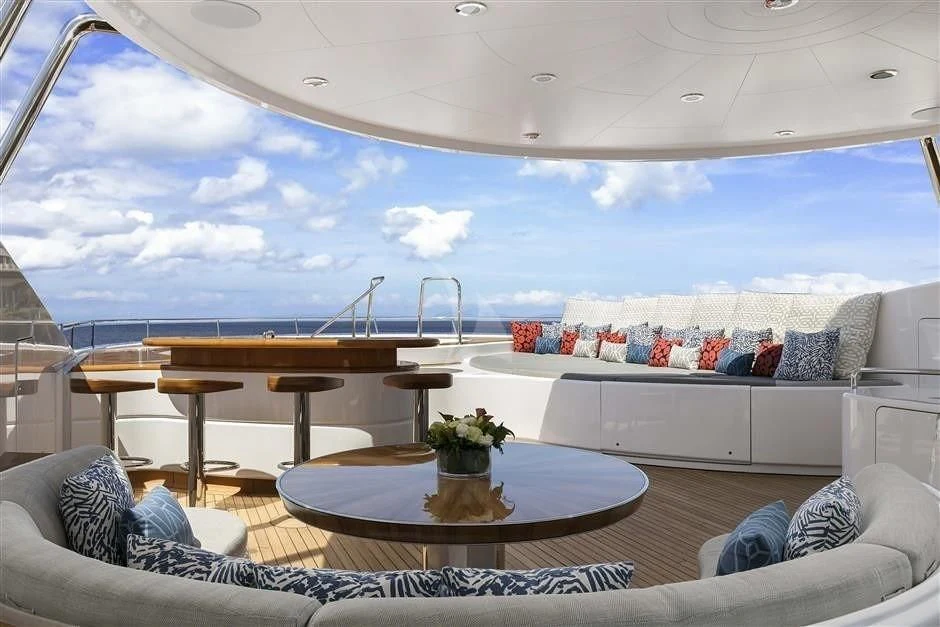 a living room with a large window aboard REVERIE Yacht for Sale