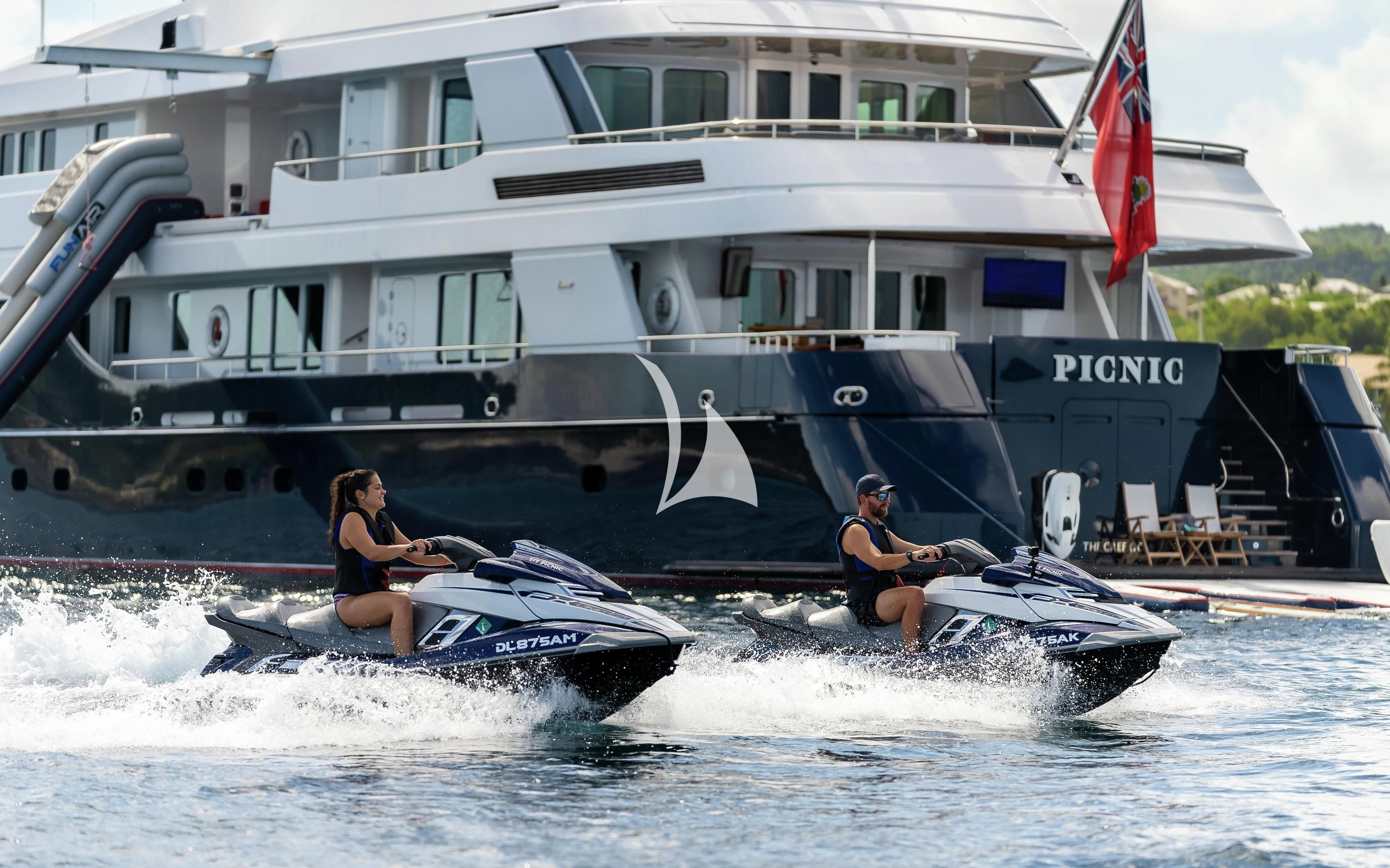 people on a jet ski aboard REVERIE Yacht for Sale