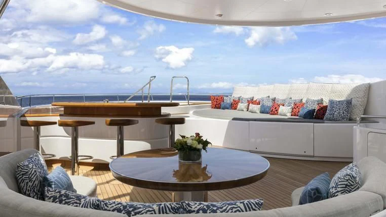 a living room with a large glass window aboard REVERIE Yacht for Sale
