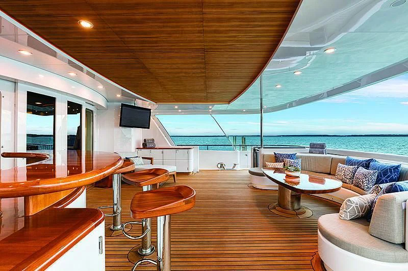 a room with a table and chairs aboard REVERIE Yacht for Sale
