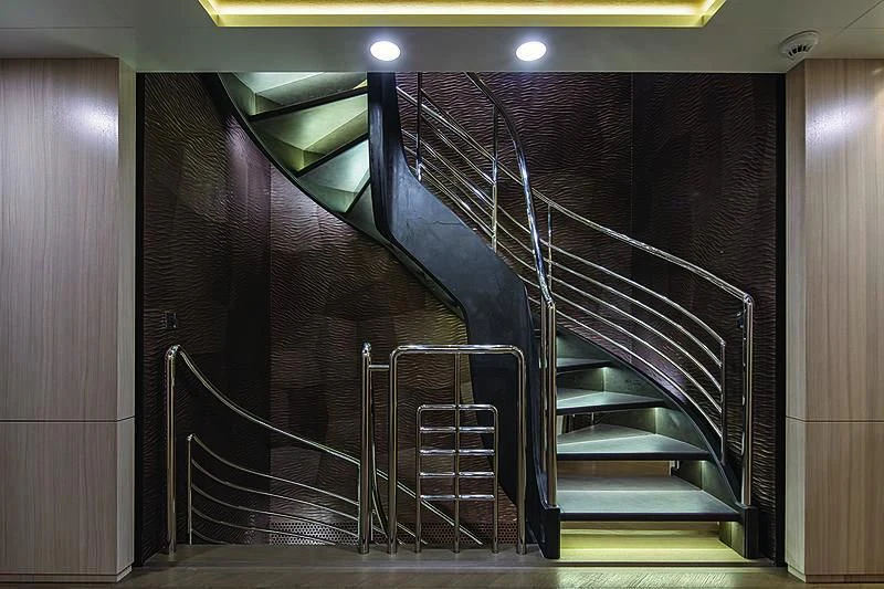a set of stairs in a building aboard REVERIE Yacht for Sale