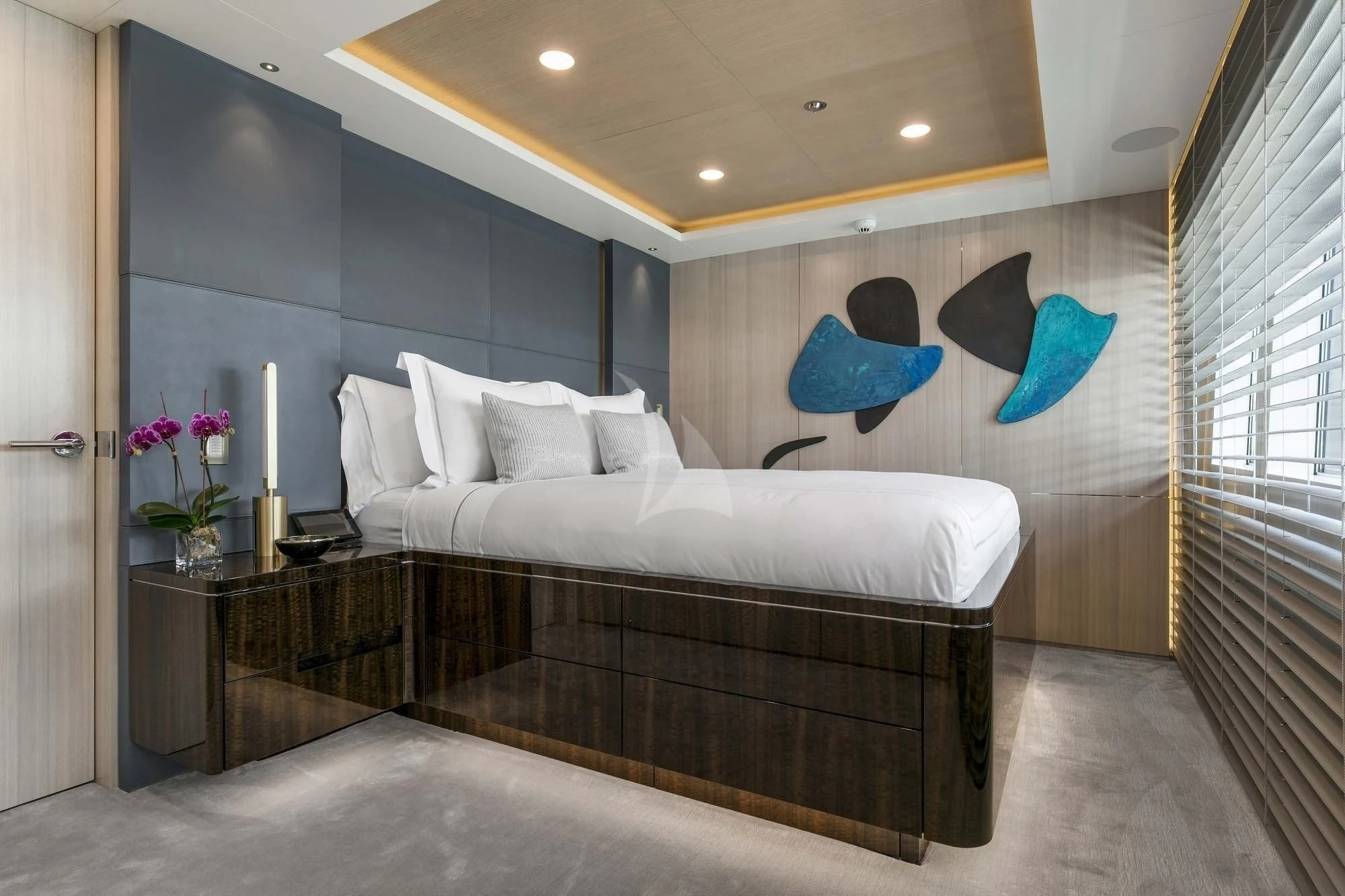 a large bedroom with a large bed aboard REVERIE Yacht for Sale