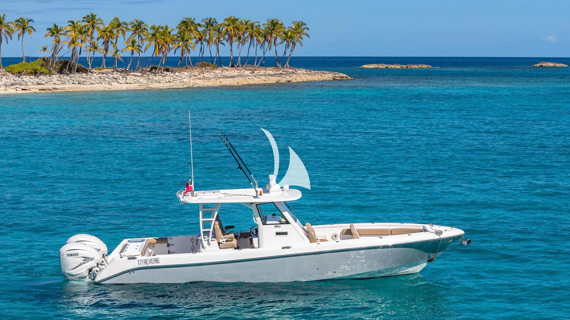a white boat on the water aboard REVERIE Yacht for Sale