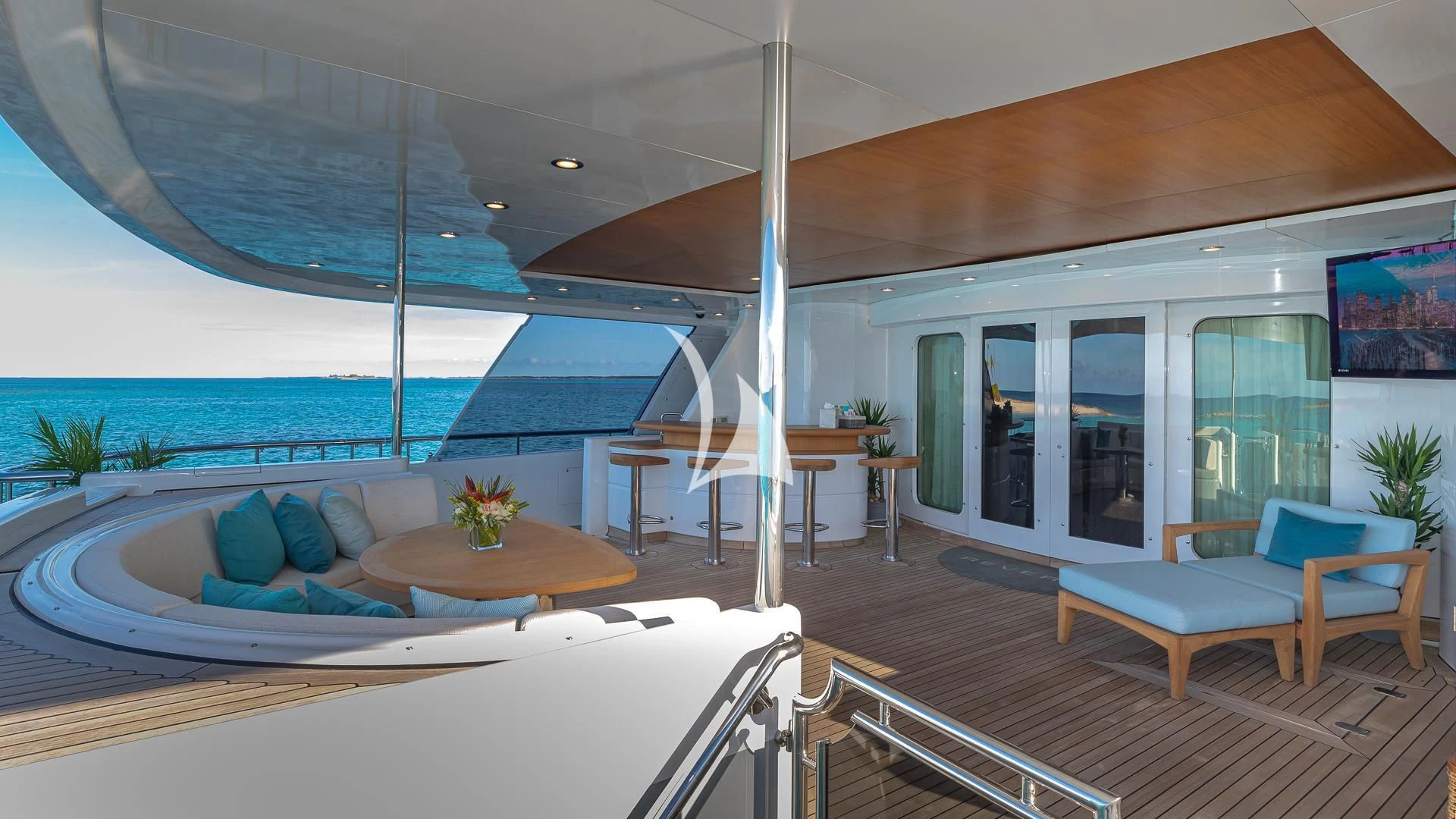 a room with a table and chairs aboard REVERIE Yacht for Sale
