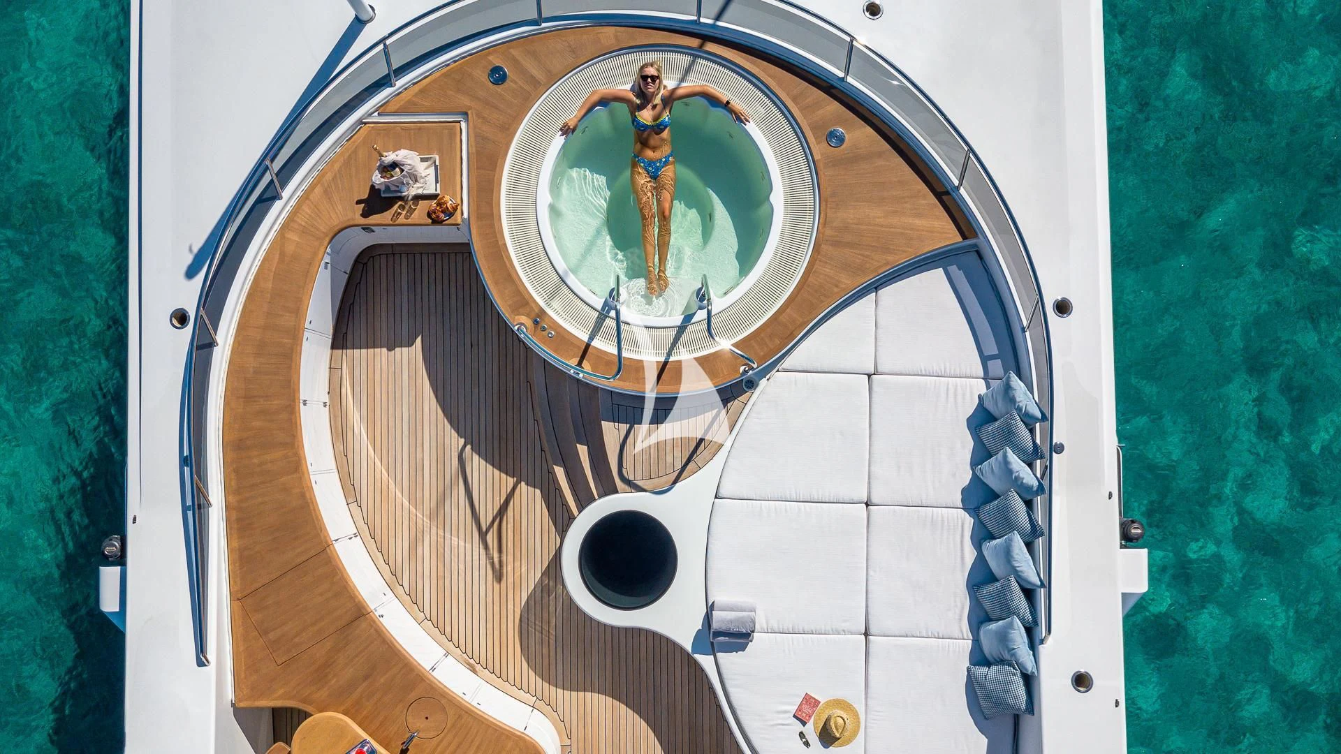 a circular white and black object aboard REVERIE Yacht for Sale