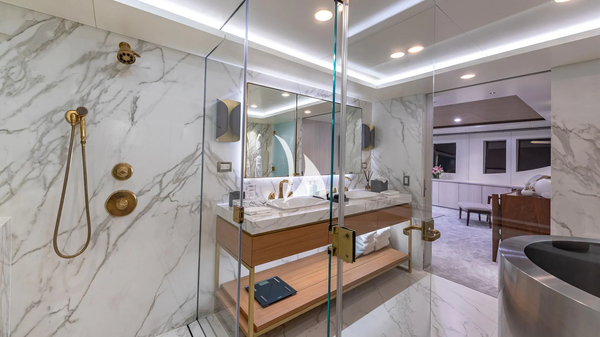 a bathroom with a sink and a mirror aboard REVERIE Yacht for Sale