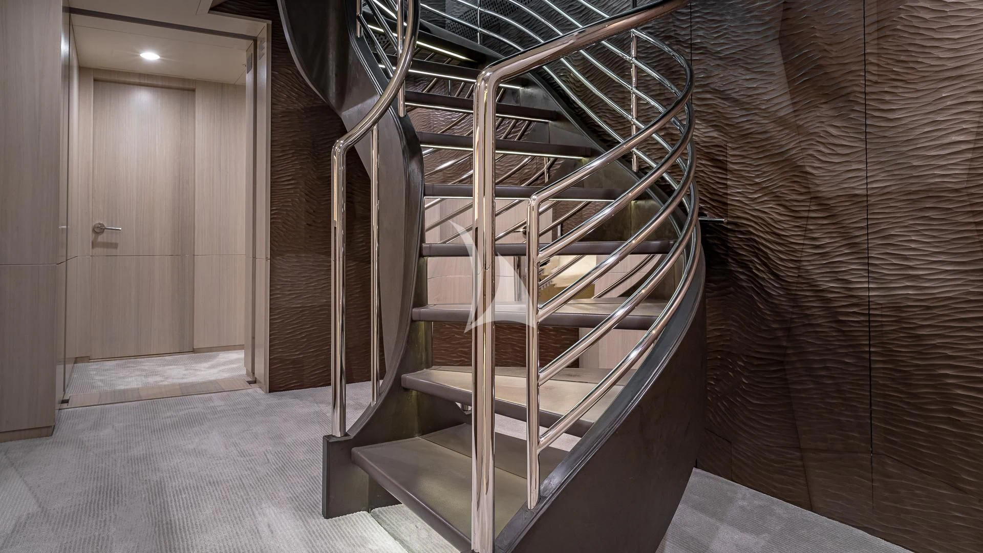 a staircase in a building aboard REVERIE Yacht for Sale