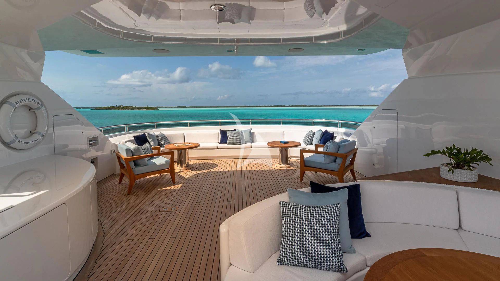 a room with a view of the ocean and a deck aboard REVERIE Yacht for Sale