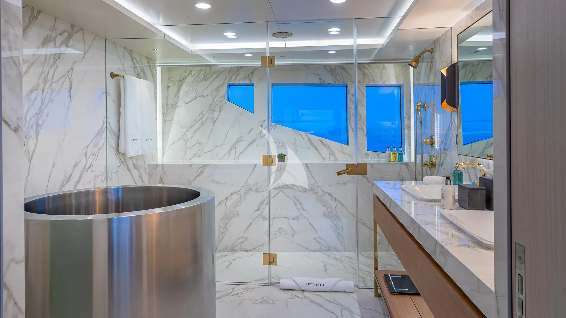 a bathroom with a shower curtain aboard REVERIE Yacht for Sale