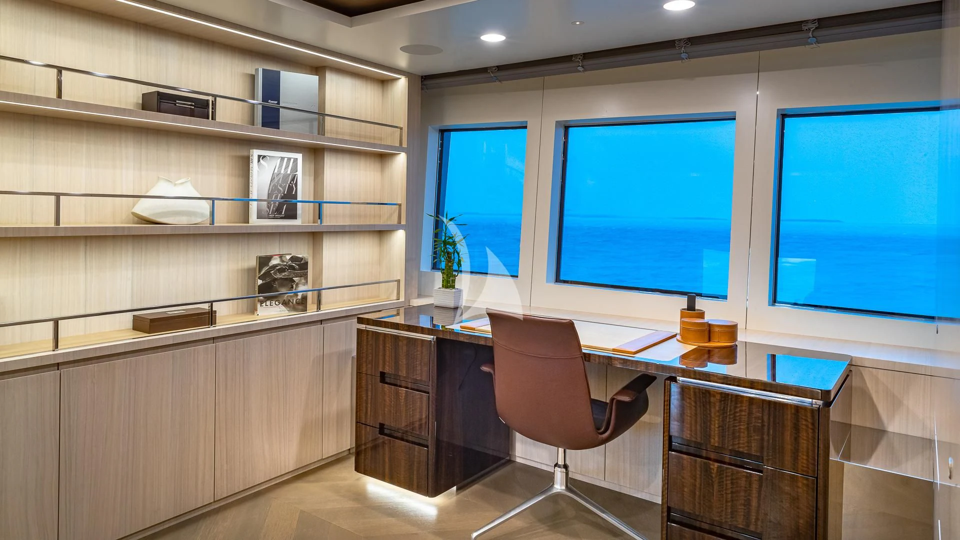 a room with a desk and a computer aboard REVERIE Yacht for Sale