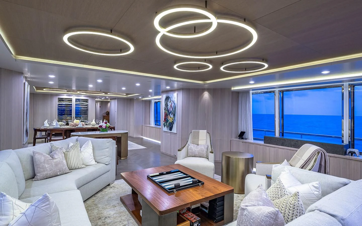a living room with a large window aboard REVERIE Yacht for Sale