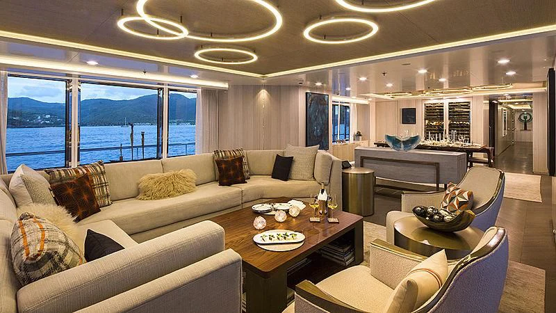a living room with a large window aboard REVERIE Yacht for Sale