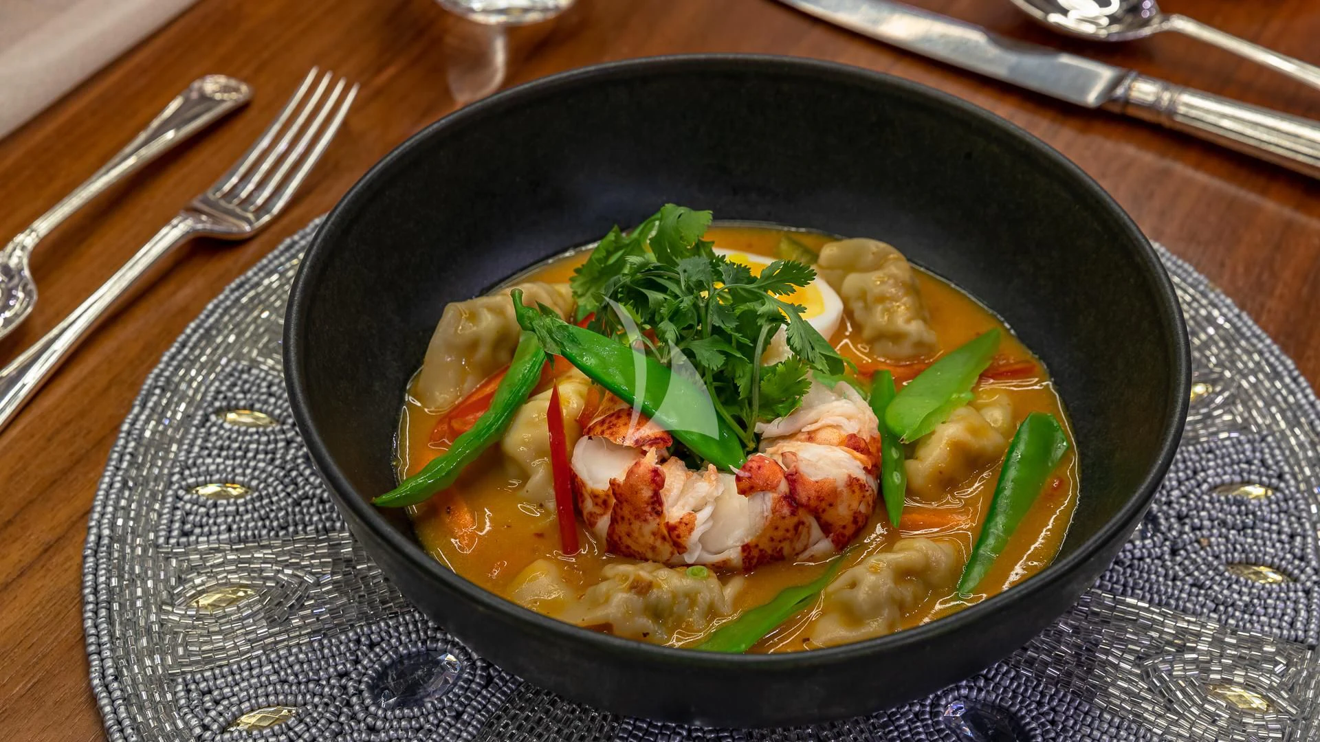 a bowl of food aboard REVERIE Yacht for Sale