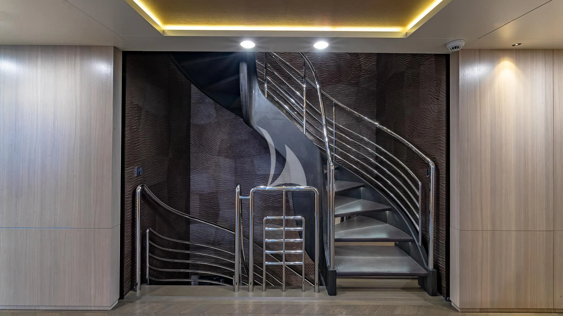 a set of stairs in a building aboard REVERIE Yacht for Sale
