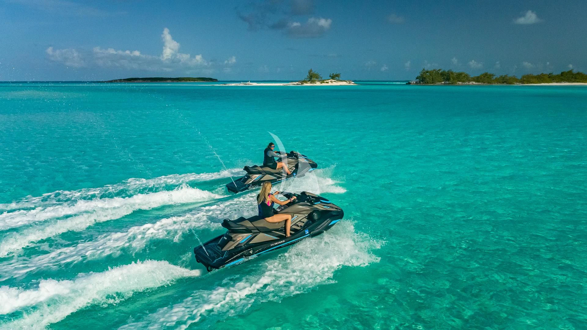 a helicopter flying over water aboard REVERIE Yacht for Sale
