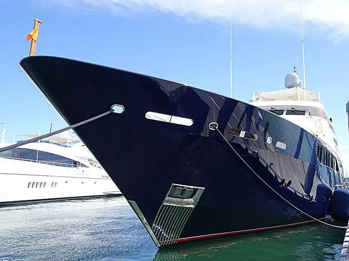 a large blue boat aboard REVERIE Yacht for Sale