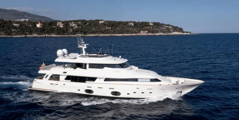 a white yacht on the water aboard CENTURION Yacht for Sale
