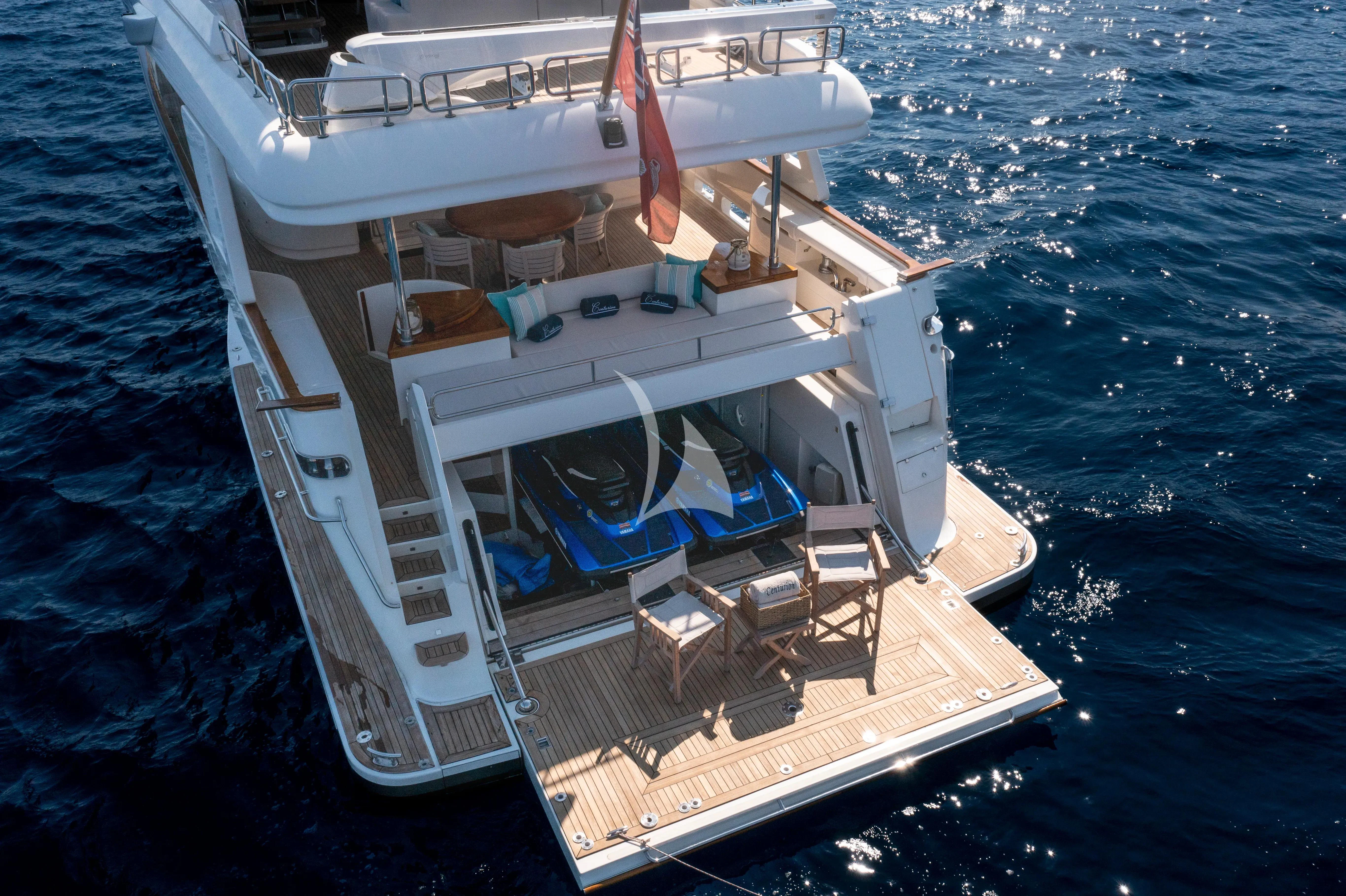 a white boat on the water aboard CENTURION Yacht for Sale