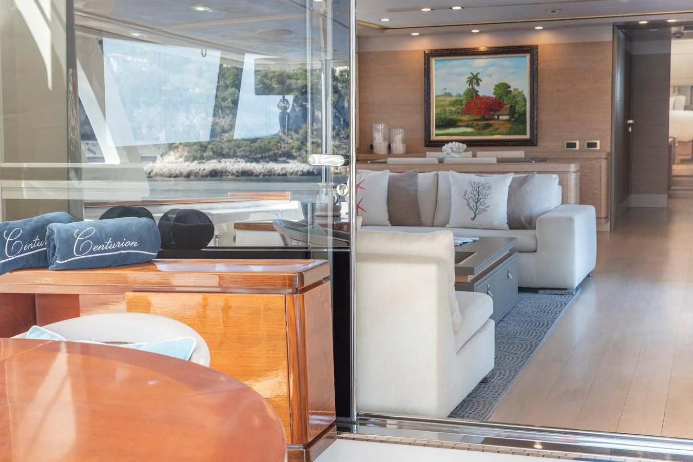 a living room with a large window aboard CENTURION Yacht for Sale