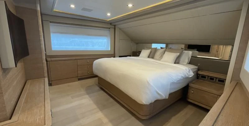 a bed in a room aboard CENTURION Yacht for Sale