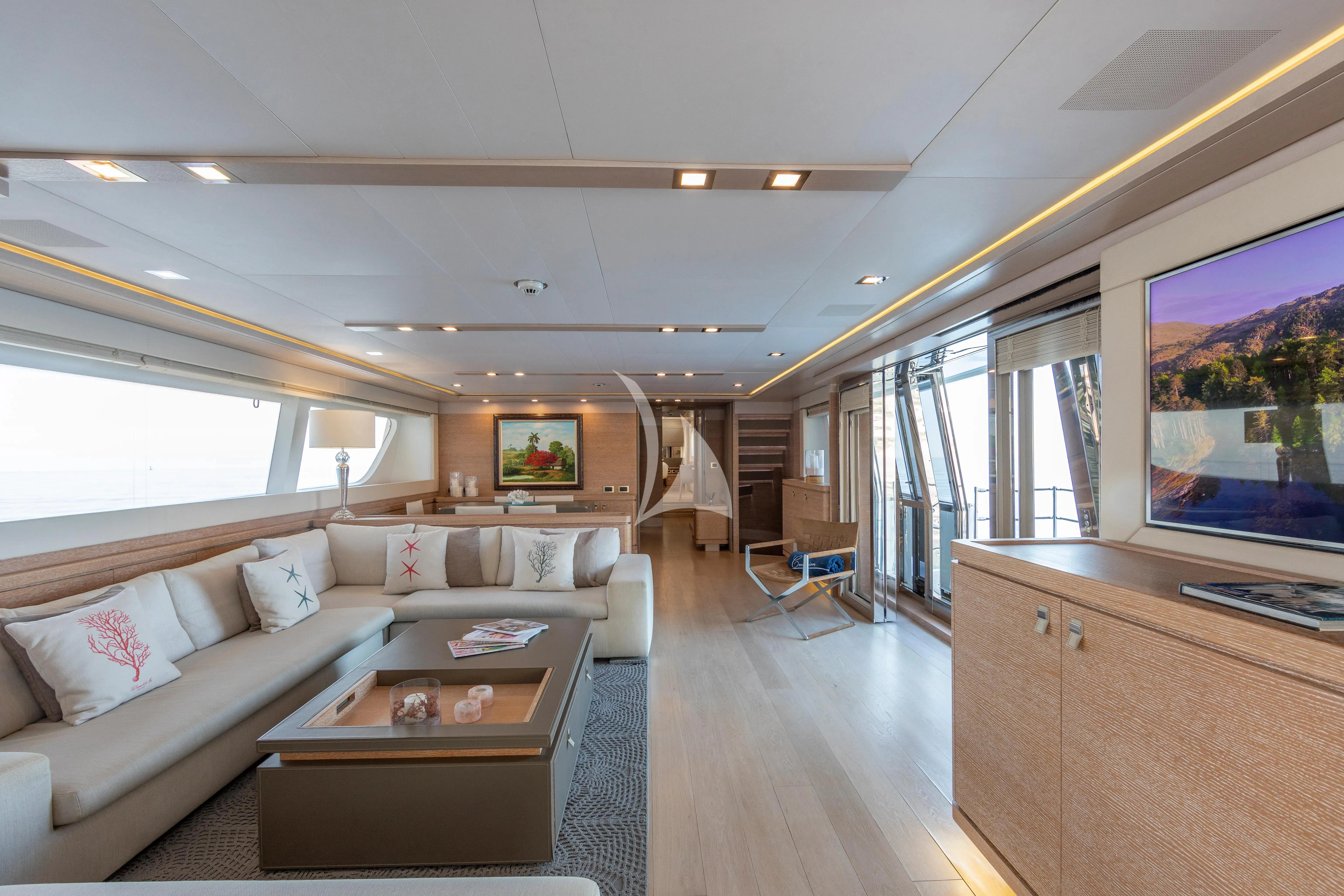 a living room with a large window aboard CENTURION Yacht for Sale
