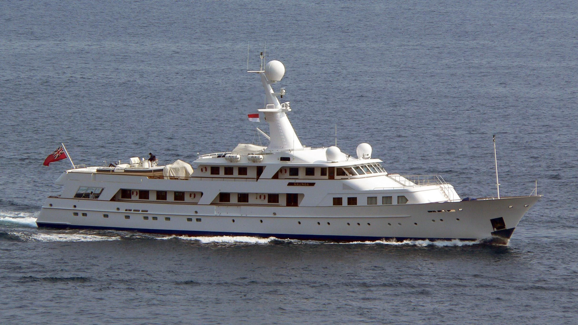a large white boat in the water aboard KALINGA Yacht for Sale