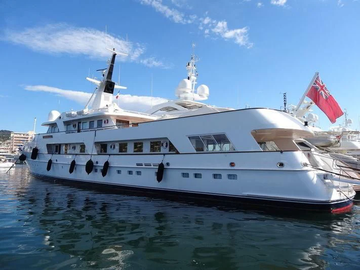 a large white boat on the water aboard KALINGA Yacht for Sale