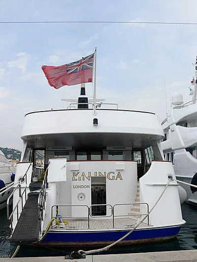 a boat with a flag on the front aboard KALINGA Yacht for Sale