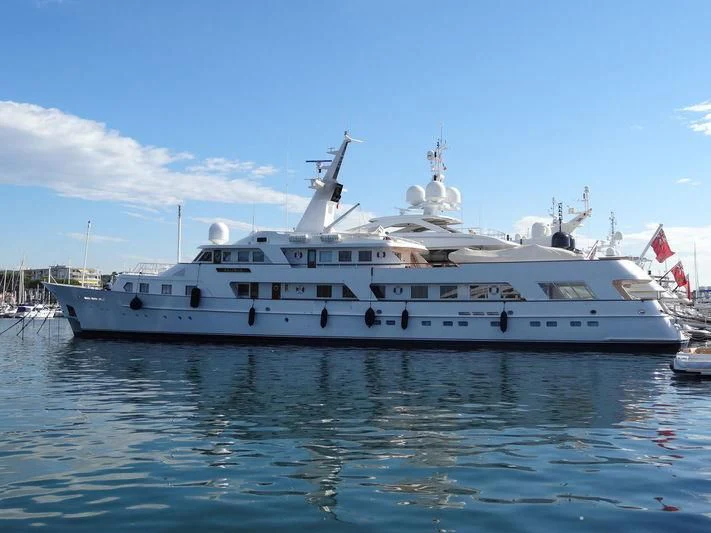 a large white boat in the water aboard KALINGA Yacht for Sale