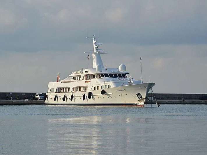 a white boat on water aboard KALINGA Yacht for Sale
