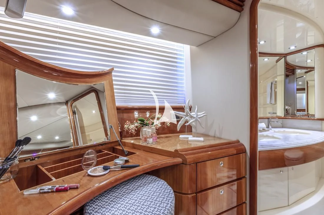 a bathroom with a mirror and sink aboard MANU Yacht for Charter