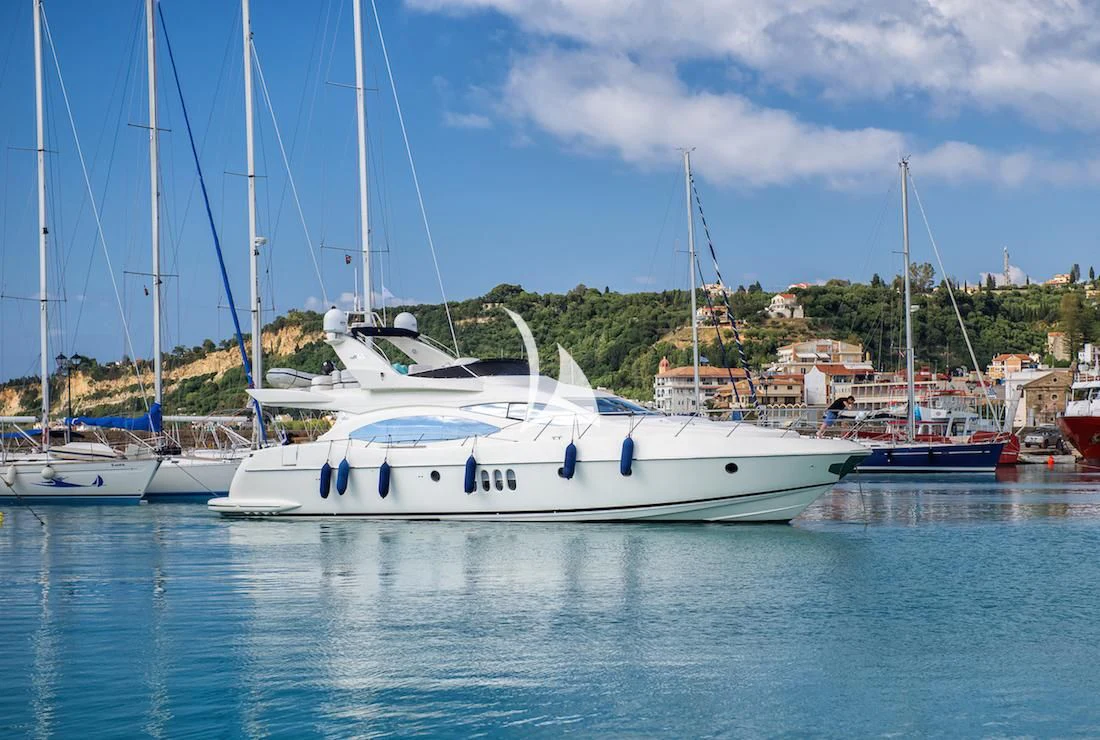 a group of boats are parked in the water aboard MANU Yacht for Charter