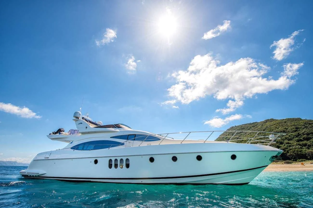 a white yacht in the water aboard MANU Yacht for Charter