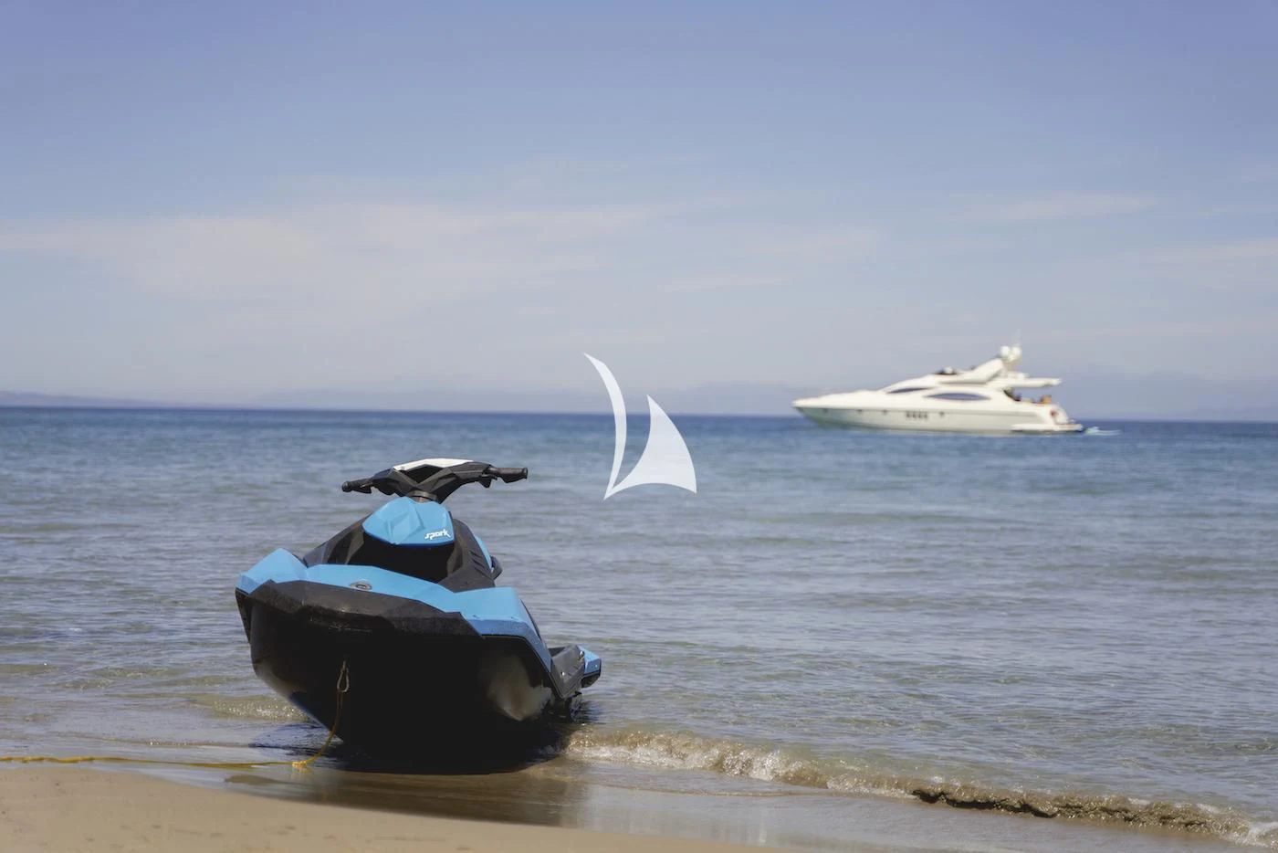 a car on the beach aboard MANU Yacht for Charter