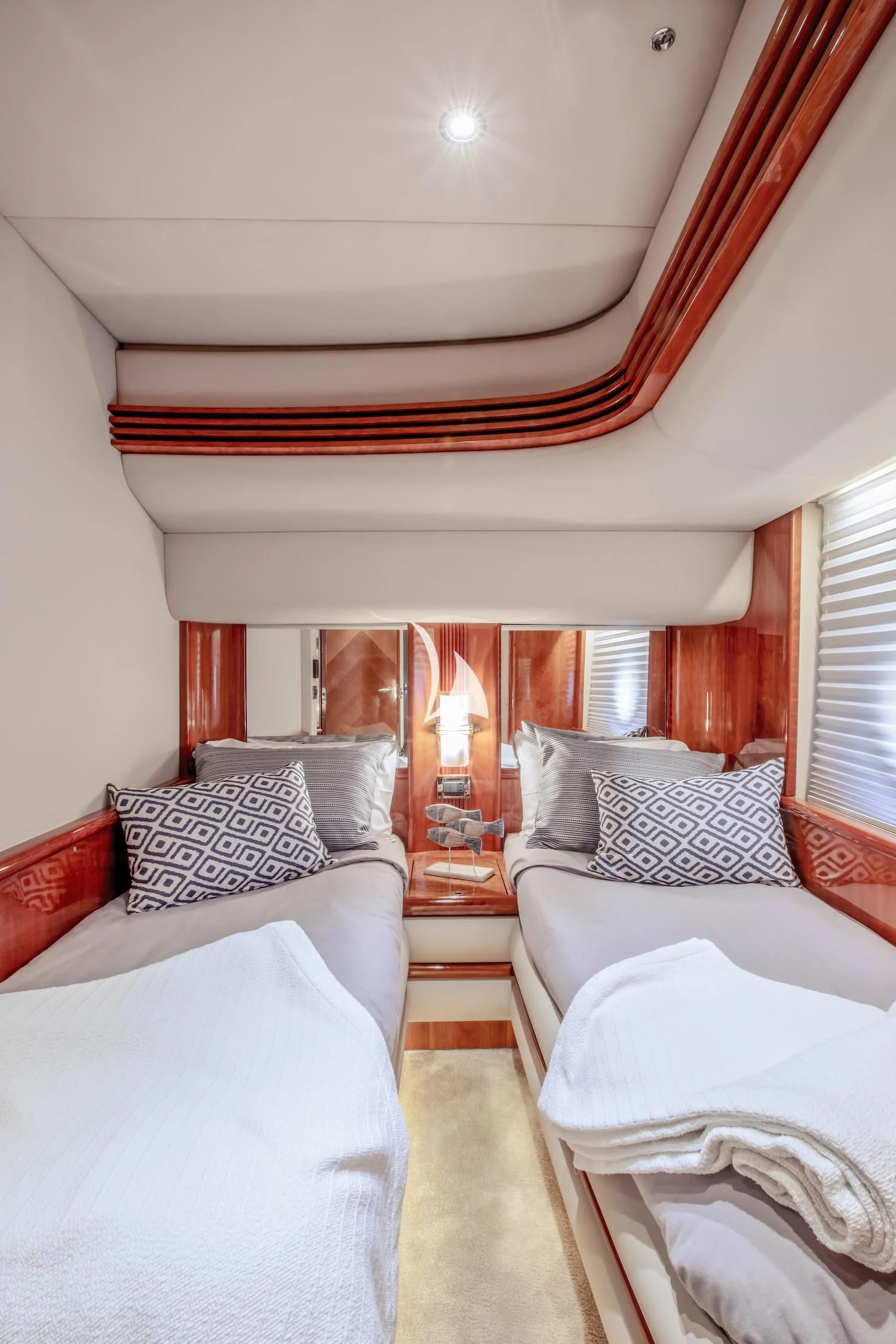 a room with two beds aboard MANU Yacht for Charter