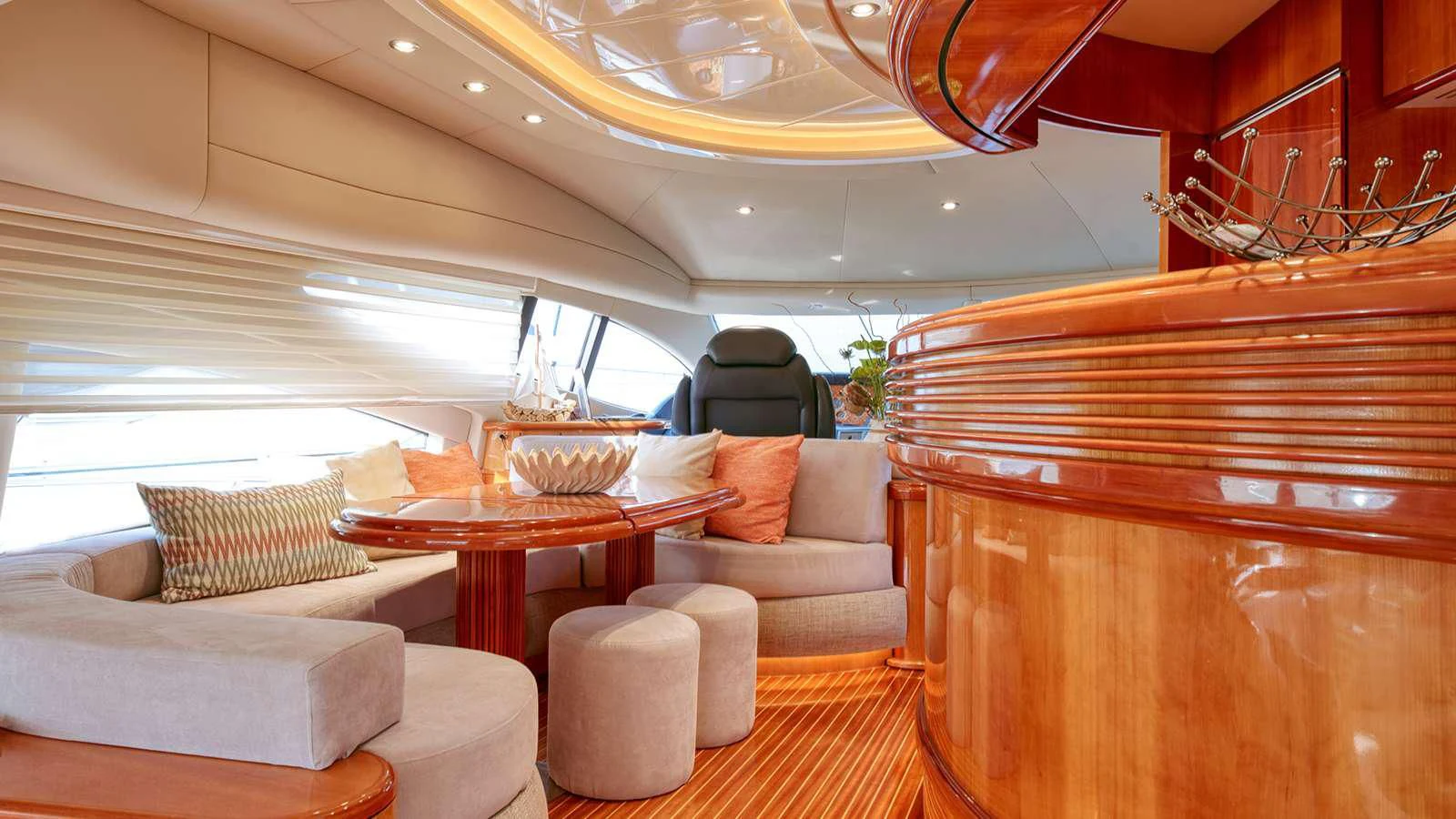 a room with a couch and a table aboard MANU Yacht for Charter