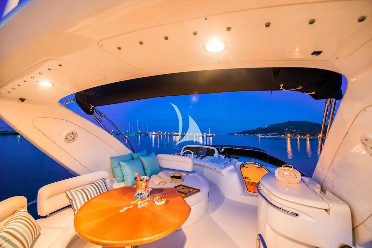 a tent with a table and chairs aboard MANU Yacht for Charter