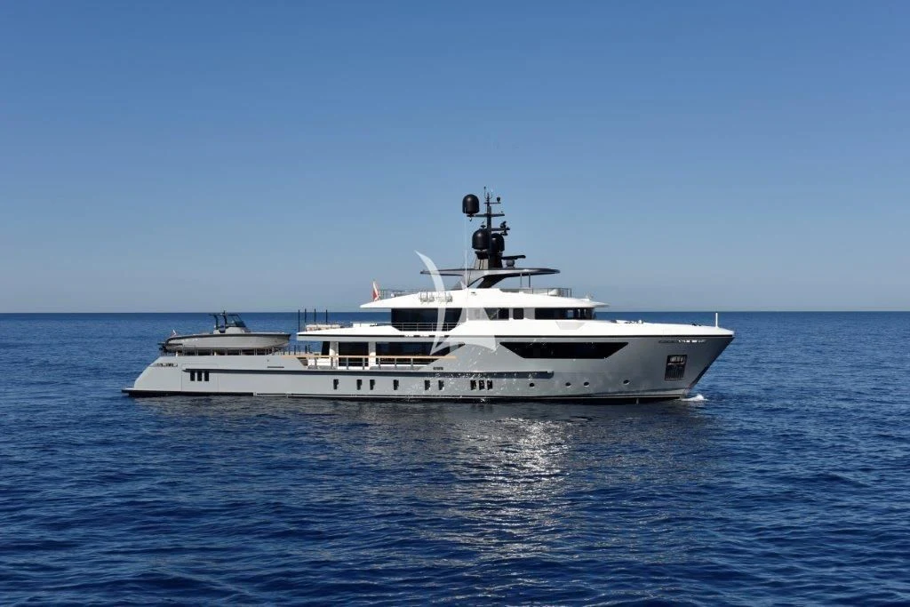 a white boat in the water aboard MYKO Yacht for Sale