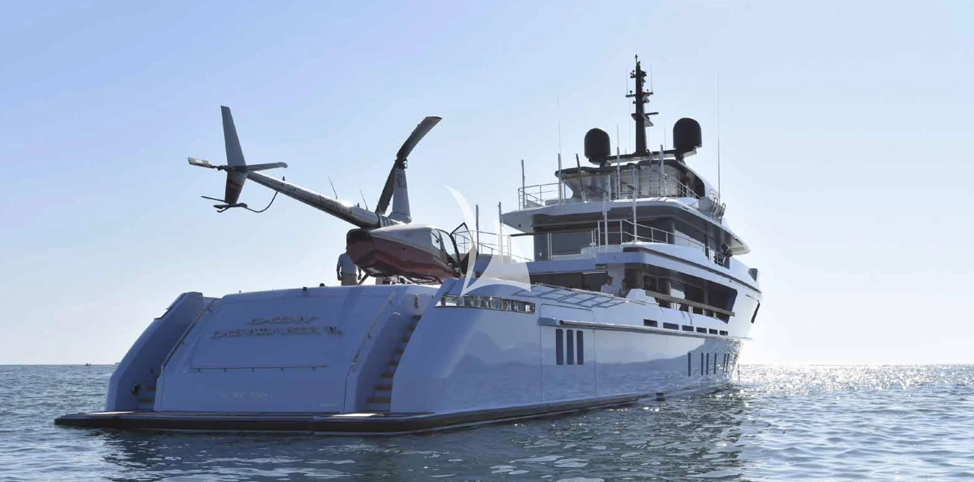 a large ship in the water aboard MYKO Yacht for Sale