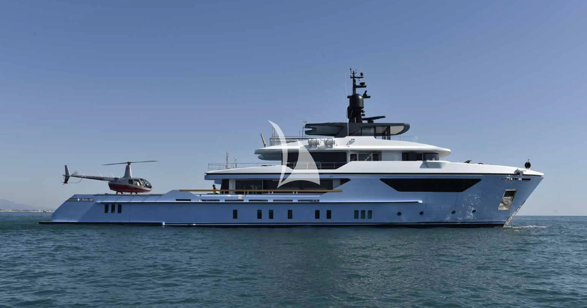 a large white boat in the water aboard MYKO Yacht for Sale