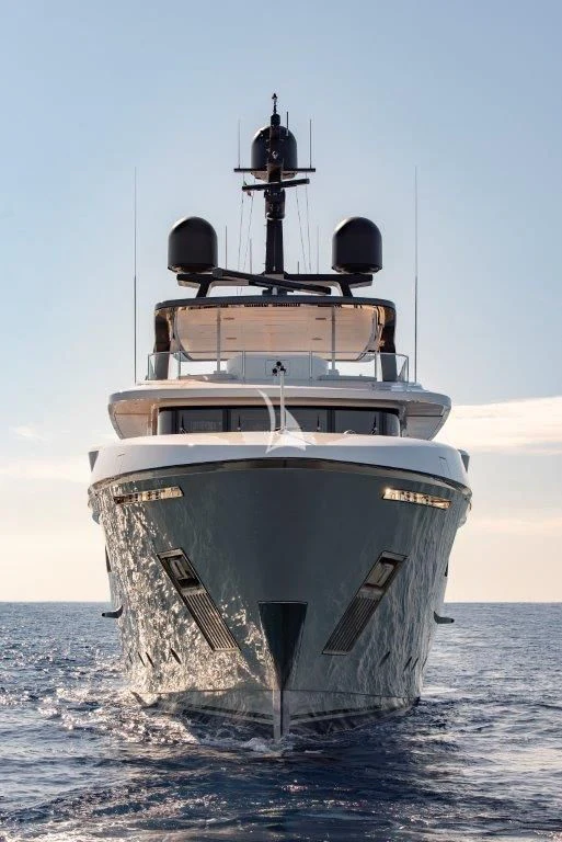 a large ship in the water aboard MYKO Yacht for Sale