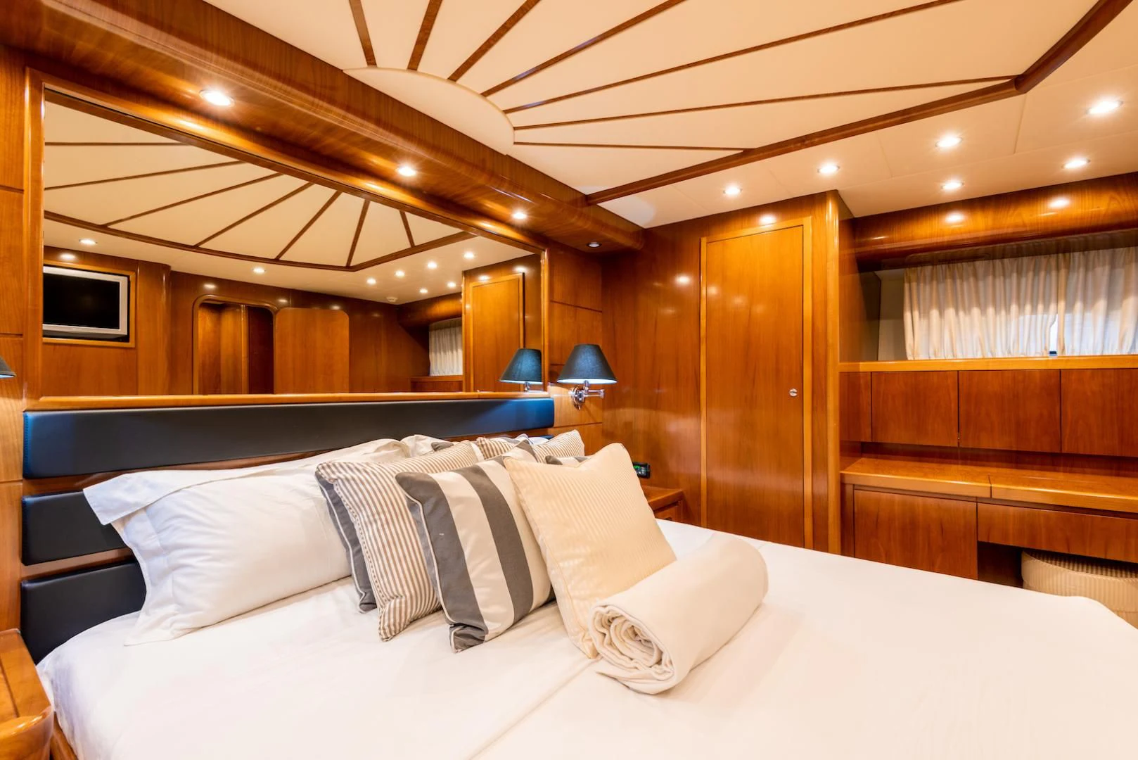 a bed with pillows aboard ALPINN Yacht for Sale