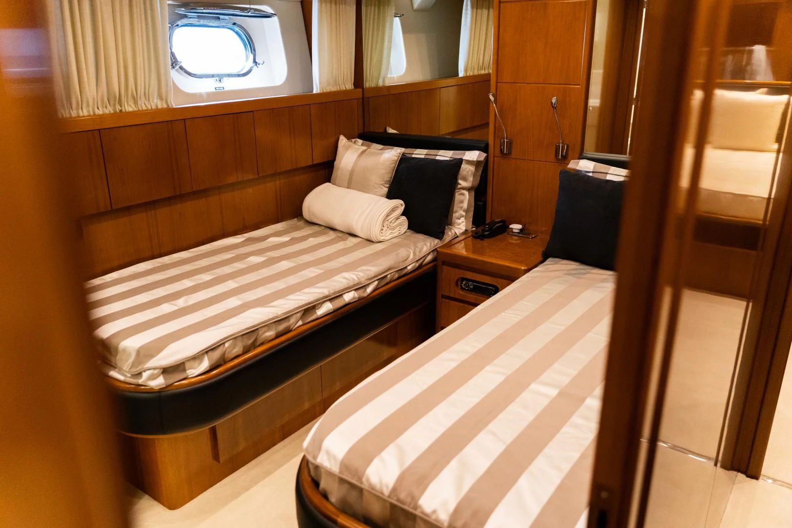 a couple of beds in a room aboard ALPINN Yacht for Sale