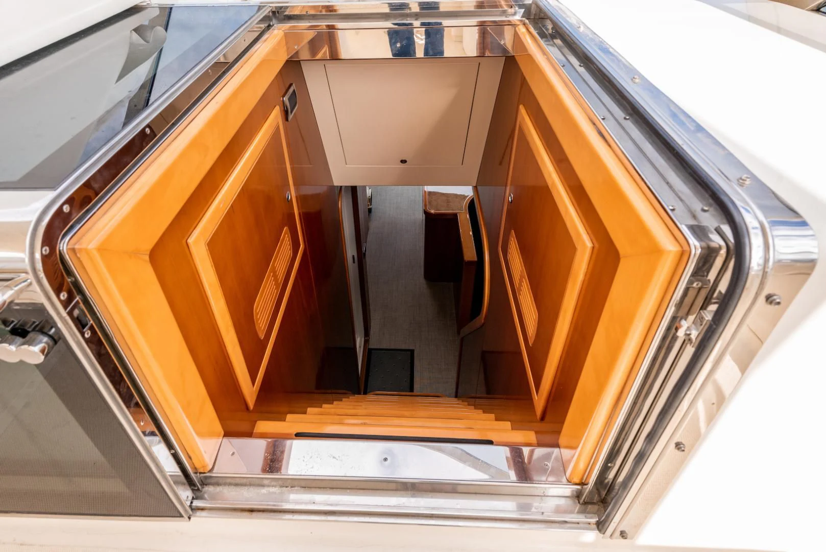 a cabinet with a door open aboard ALPINN Yacht for Sale