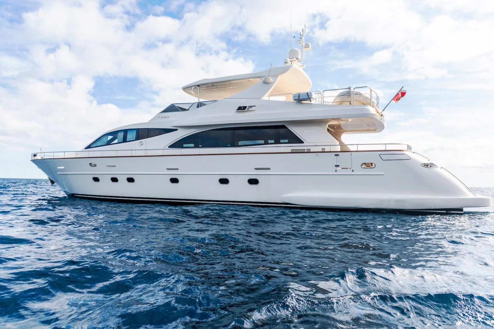 a white yacht in the water aboard ALPINN Yacht for Sale